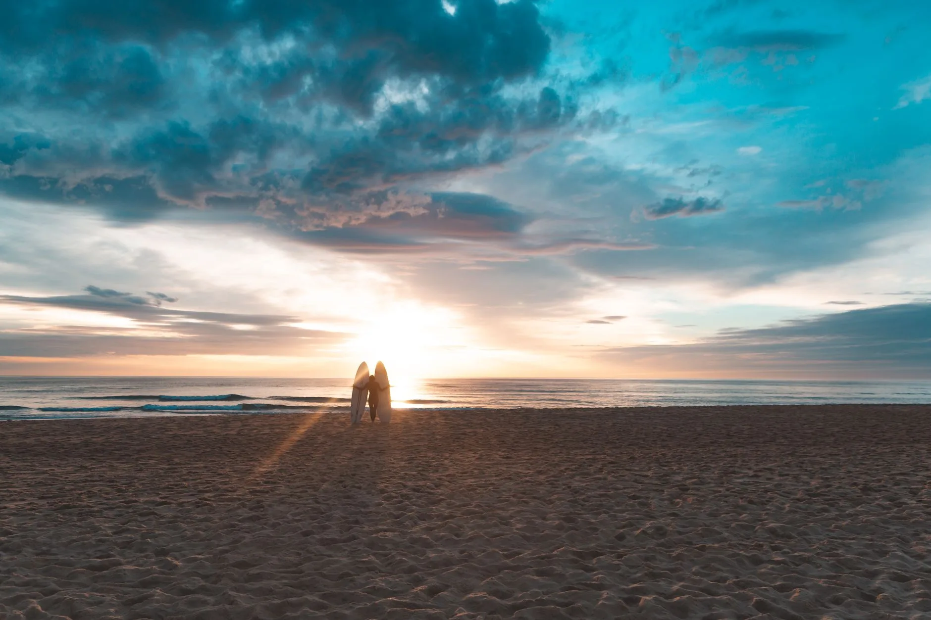 Sunset on the beach, board resting
